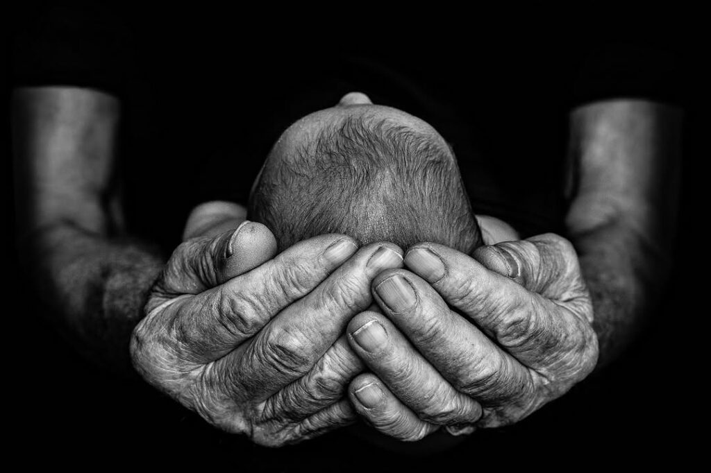 Yvonne C. Krystovsky is an international, multi-award-winning professional photographer specializing in contemporary newborn and maternity photography