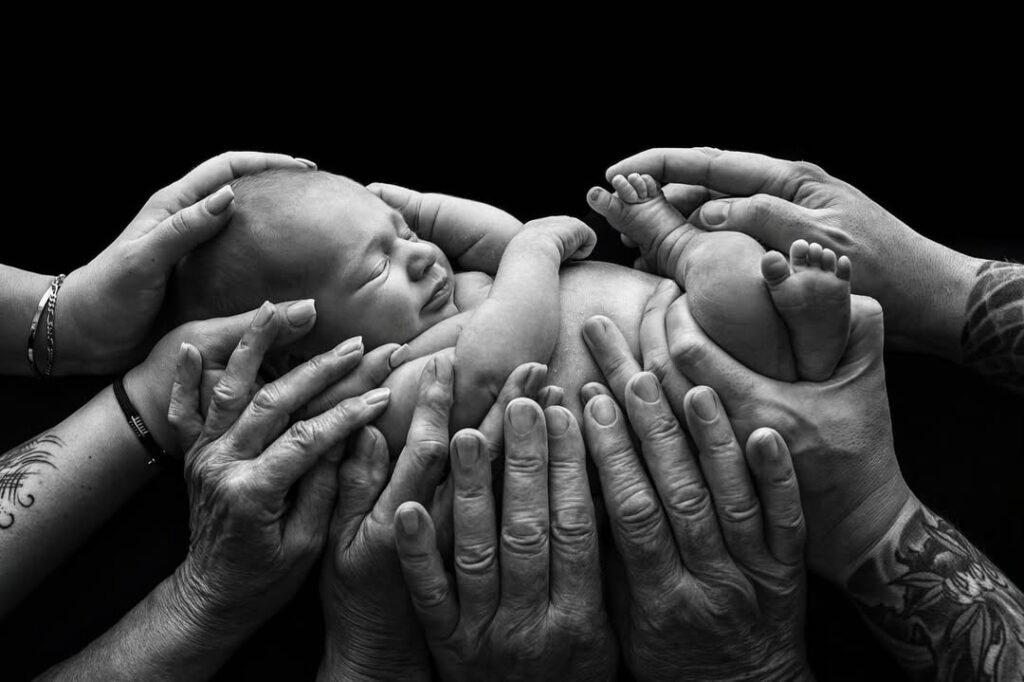 Yvonne C. Krystovsky is an international, multi-award-winning professional photographer specializing in contemporary newborn and maternity photography